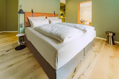 Ein Bett oder Betten in einem Zimmer der Unterkunft KABINETT Boutique Apartments