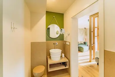 Ein Badezimmer in der Unterkunft KABINETT Boutique Apartments