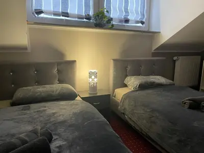 Ein Bett oder Betten in einem Zimmer der Unterkunft Ferienwohnung Bina