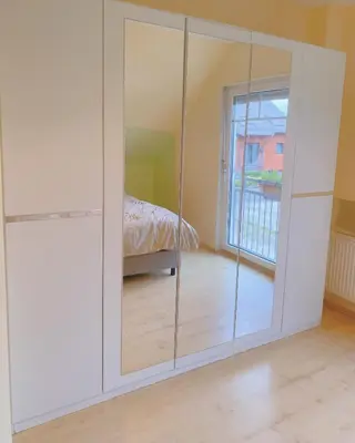 Ein Bett oder Betten in einem Zimmer der Unterkunft OTTOC Ferienwohnung