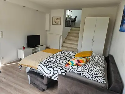 Ein Bett oder Betten in einem Zimmer der Unterkunft Wohnen am Allerheiligenberg