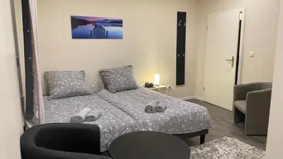 Ein Bett oder Betten in einem Zimmer der Unterkunft Pellinger-Hof
