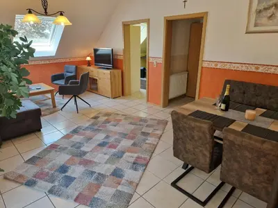 Ein Sitzbereich in der Unterkunft Ferienwohnung Flair