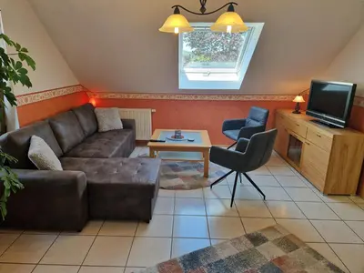 Ein Sitzbereich in der Unterkunft Ferienwohnung Flair