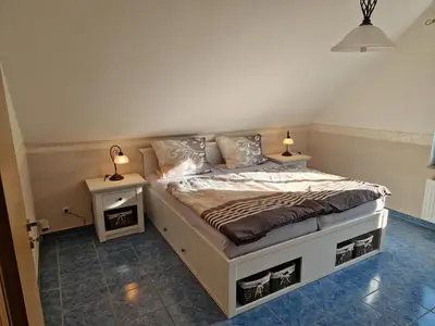 Ein Bett oder Betten in einem Zimmer der Unterkunft Ferienwohnung Flair