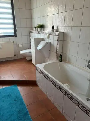 Ein Badezimmer in der Unterkunft Ferienwohnung Layer Moselbogen