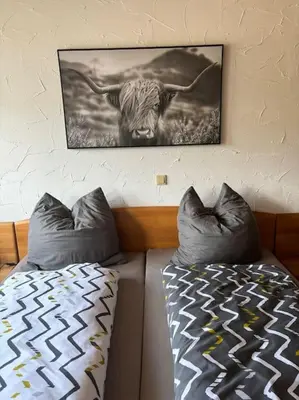 Ein Bett oder Betten in einem Zimmer der Unterkunft Ferienwohnung Layer Moselbogen