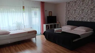 Ein Bett oder Betten in einem Zimmer der Unterkunft Ninas Ferienwohnung