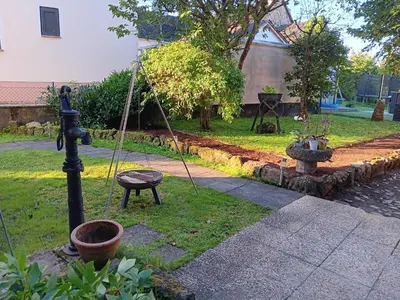 Ein Garten an der Unterkunft Ninas Ferienwohnung