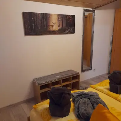 Ein Bett oder Betten in einem Zimmer der Unterkunft Bichlhof Bärfra Ferienwohnung Fernsicht