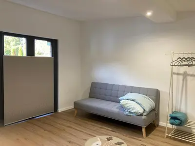 Ein Sitzbereich in der Unterkunft Ferienhaus Hohenleimbach
