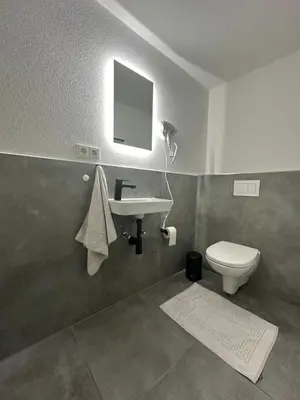Ein Badezimmer in der Unterkunft Fewo Waldblick - Urlaub im Wein & Ferienort Bekond