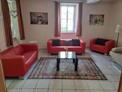 Ein Sitzbereich in der Unterkunft Ferienwohnung Jüngling
