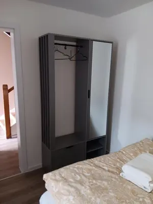 Ein Bett oder Betten in einem Zimmer der Unterkunft Ninas & Andrejs Gästezimmer