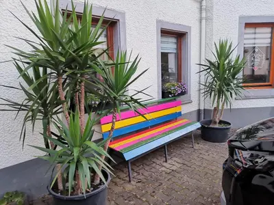 Ein Garten an der Unterkunft Pension am Kirchberg - Zimmer 1
