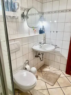 Ein Badezimmer in der Unterkunft Ferienwohnung Theisen