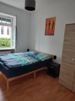 Ein Bett oder Betten in einem Zimmer der Unterkunft Kzwei