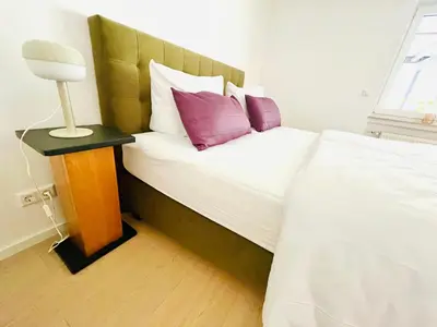 Ein Bett oder Betten in einem Zimmer der Unterkunft Wildblick