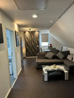 Ein Sitzbereich in der Unterkunft AdiFerienwohnung