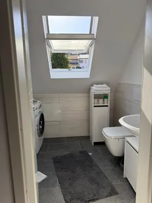 Ein Badezimmer in der Unterkunft AdiFerienwohnung