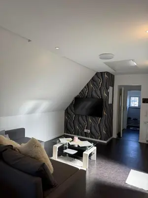 Ein Sitzbereich in der Unterkunft AdiFerienwohnung