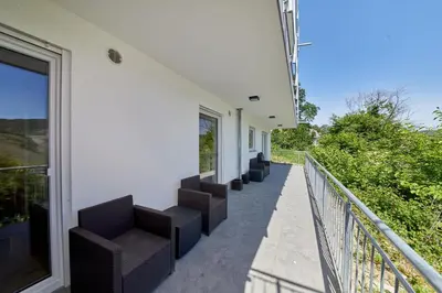 Ein Balkon oder eine Terrasse in der Unterkunft FEWO Henri