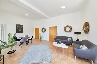 Ein Sitzbereich in der Unterkunft Ferienwohnungen am Gestade Wohnung 2