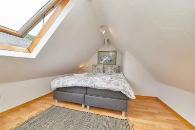 Ein Bett oder Betten in einem Zimmer der Unterkunft Berntraube 3