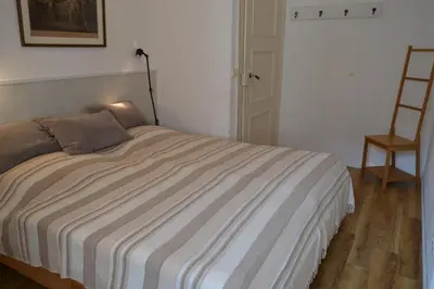 Ein Bett oder Betten in einem Zimmer der Unterkunft Ferienwohnungen am Stadtpalais Fewo-Mosel