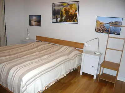 Ein Bett oder Betten in einem Zimmer der Unterkunft Ferienwohnung am Stadtpalais Fewo-Steillage