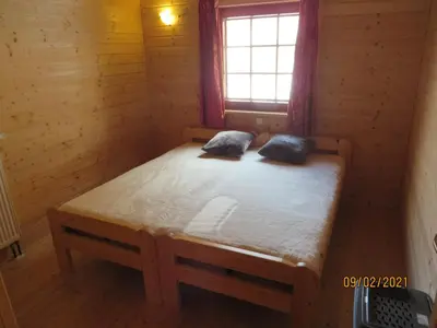 Ein Bett oder Betten in einem Zimmer der Unterkunft Ferienhaus Maja