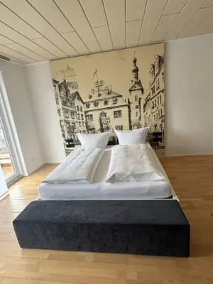 Ein Bett oder Betten in einem Zimmer der Unterkunft Moselfreude Heimat