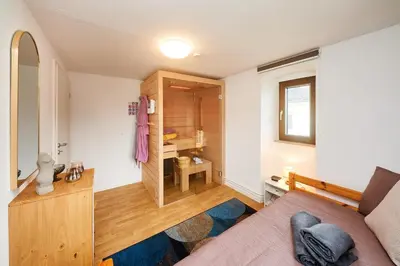 Ein Bett oder Betten in einem Zimmer der Unterkunft Ferienwohnungen Villa Mosella