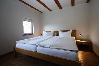 Ein Bett oder Betten in einem Zimmer der Unterkunft Gasthaus Pension Geimer