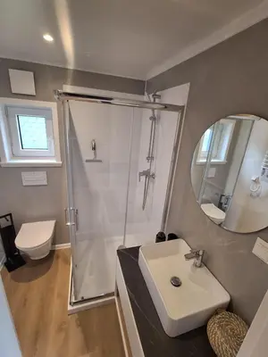 Ein Badezimmer in der Unterkunft LandZeit - get your tiny moments