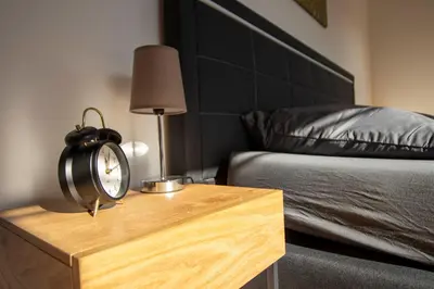 Ein Bett oder Betten in einem Zimmer der Unterkunft FeWo Wohlleben Petrus VI