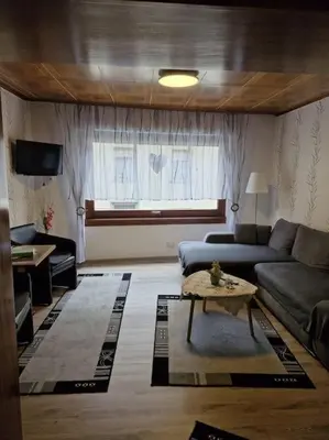 Ein Sitzbereich in der Unterkunft Ferienhaus Heimes