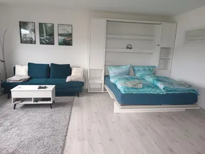 Ein Bett oder Betten in einem Zimmer der Unterkunft Apartment mit Rheinblick