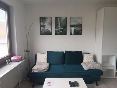 Ein Sitzbereich in der Unterkunft Apartment mit Rheinblick