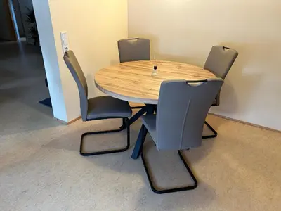 Ein Sitzbereich in der Unterkunft Ferienhaus Zur alten Linde