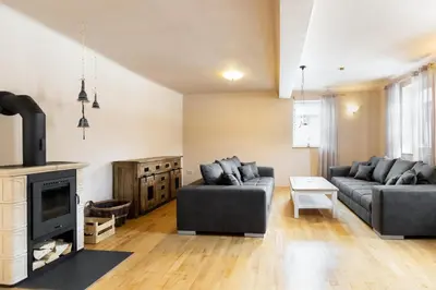 Ein Sitzbereich in der Unterkunft Ferienhaus Zur alten Linde