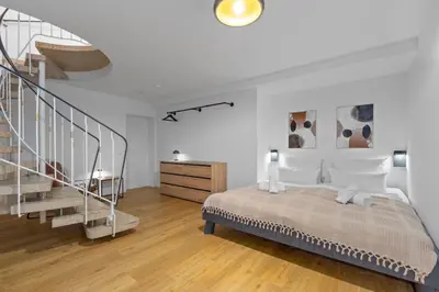 Ein Bett oder Betten in einem Zimmer der Unterkunft Design-Apartments in Top Lage - Familienfreundlich - Küche - Parkplätze - Fahrradstellplätze - Streaming