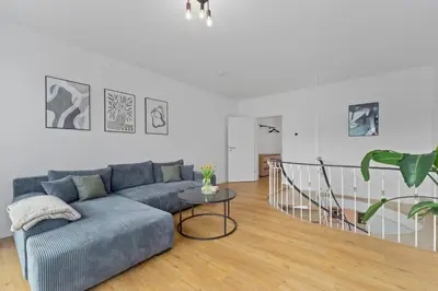 Ein Sitzbereich in der Unterkunft Design-Apartments in Top Lage - Familienfreundlich - Küche - Parkplätze - Fahrradstellplätze - Streaming