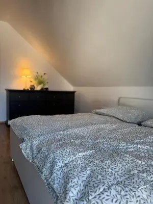 Ein Bett oder Betten in einem Zimmer der Unterkunft Familien Ferienhaus im Grünen in direkter Nähe zum Nürburgring