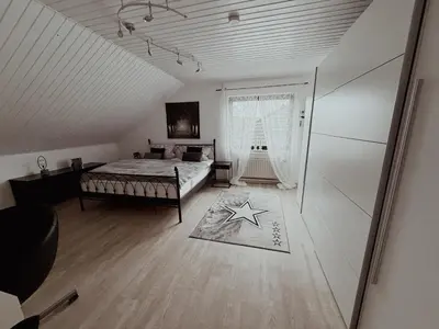 Ein Bett oder Betten in einem Zimmer der Unterkunft Ferienwohnung de Flingou