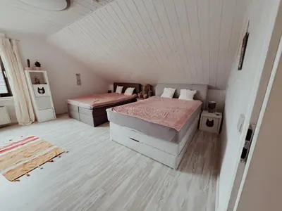 Ein Bett oder Betten in einem Zimmer der Unterkunft Ferienwohnung de Flingou