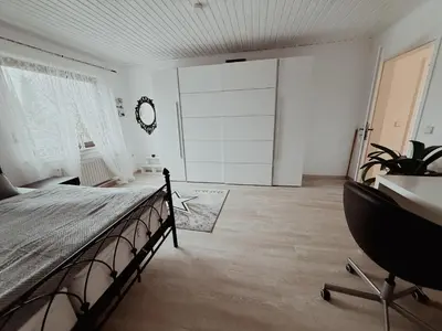 Ein Bett oder Betten in einem Zimmer der Unterkunft Ferienwohnung de Flingou