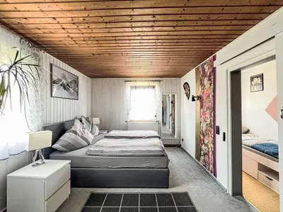 Ein Bett oder Betten in einem Zimmer der Unterkunft Holiday Home Ferienhaus Renata nahe Nürburgring by Interhome