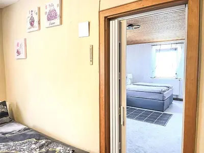 Ein Bett oder Betten in einem Zimmer der Unterkunft Holiday Home Ferienhaus Renata nahe Nürburgring by Interhome