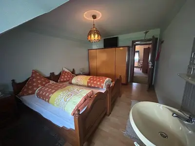 Ein Bett oder Betten in einem Zimmer der Unterkunft Gasthaus Zur Krone